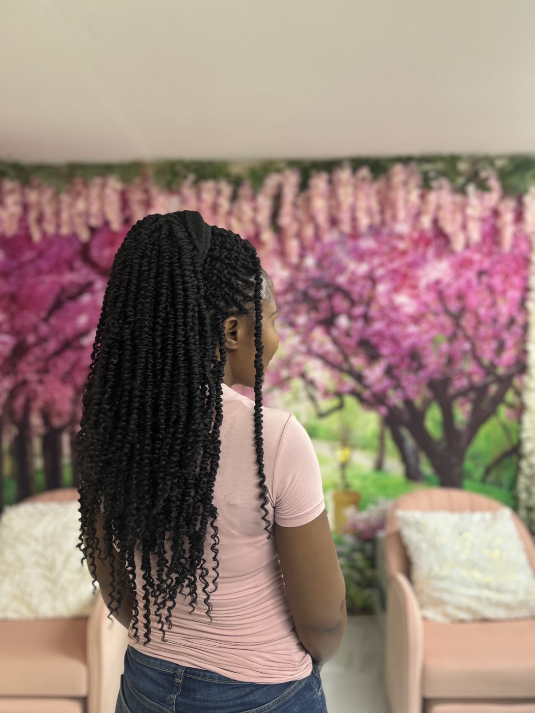 Finished shoulder-length textured twists from the back